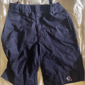 Grown out of boy navy school shorts .Size 14 boys with adjustable waist band
